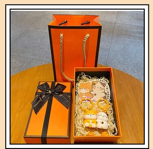 Cute resin cat keychain set in a premium orange gift box with matching tote bag