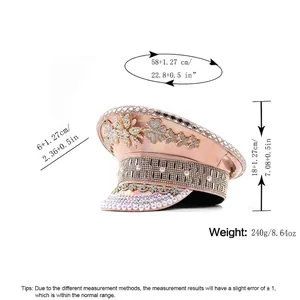 Sparkling champagne leather party hat with rhinestones and floral details in side view