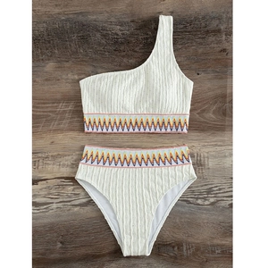 White one-shoulder high-waisted bikini set with colorful wavy embroidery on ripple fabric