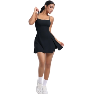 Close-up of black athletic dress featuring slim straps and flexible side slit detail