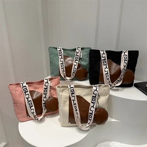 Contrast canvas tote bag in four colors with wide geometric shoulder strap and coin purse