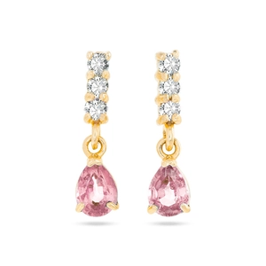 Macro detail of drop earrings with pink pear-cut gemstones and sparkling white zircons