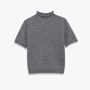 Detail of dark grey mock neck knit top featuring soft rolled edges and fine texture