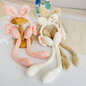 Plush animal ear muffs with moving air sacs and heart embroidery in pink, white, and tan