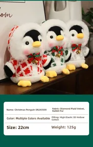 Three plush Christmas penguins with bells and bows, red green and grey holiday dolls