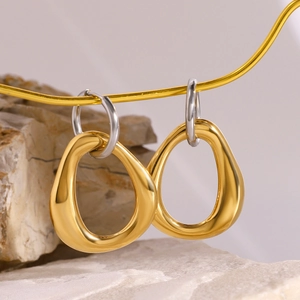 Irregular hollow 18k gold and silver two-tone earrings for women in stainless steel