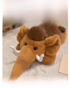 Close-up of soft mammoth plush blanket with furry texture and cute ivory details