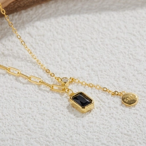 S925 silver necklace with black spinel pendant and round diamond on white fabric