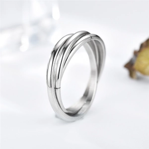 Polished silver stainless steel triple interlocking ring with minimalist geometric design
