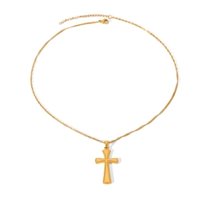 Detailed view of the 18k gold cross pendant and twisted link chain on a white background