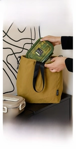 Close-up of mustard yellow insulated lunch bag showing large capacity for food containers