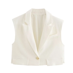 Detailed flat lay of a white sleeveless button-down vest with lapels and flap pockets