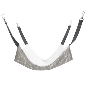 Detail of hanging cat hammock with grey plaid fabric, soft plush lining and metal clips