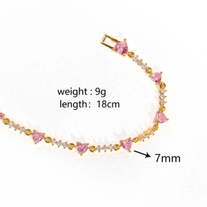 Detail of 18cm gold heart bracelet featuring 7mm pink zircon stones and square clasp