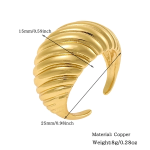 Detailed view of golden copper ring with shell texture and 15mm width specifications