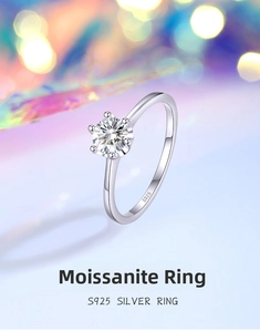Macro shot of 5mm moissanite ring with six-prong setting and S925 silver hallmark detail
