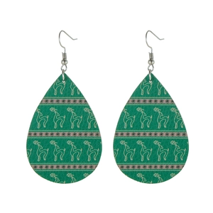 Close-up of green teardrop leather earrings with elk patterns and festive floral stripes
