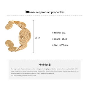 Detailed specifications of wide gold open cuff with spiral textured relief decoration