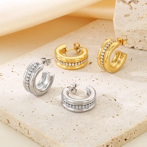 Retro stainless steel C-shaped earrings with sparkling cubic zirconia inlay on stone base