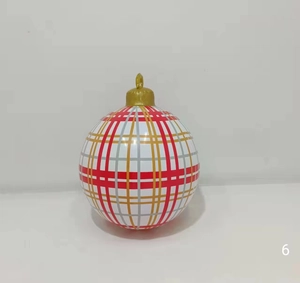 Detail of 60cm inflatable Christmas ball with red and gold plaid pattern and top loop