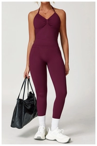 Detailed back view of high-waisted burgundy yoga leggings with scrunch butt lift design