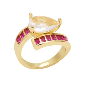 Elegant gold ring with a pear-cut clear zircon and channel-set rectangular red gemstones