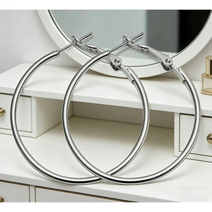 Minimalist silver-colored large hoop earrings with a polished finish for women