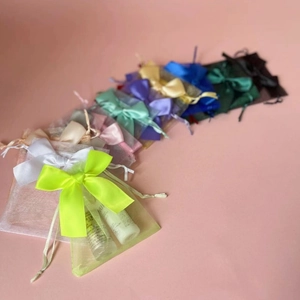 Colorful organza gift bags with ribbon drawstrings for cosmetics storage