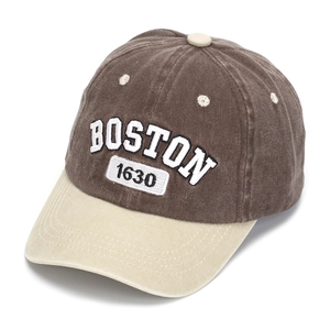 Detailed embroidery of BOSTON 1630 on a vintage two-tone cotton baseball cap