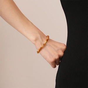 Tiger eye stone beaded bracelet with golden fish tube charm for women in retro style