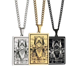 Three tarot Chariot pendants in gold, silver, and black finishes on O-chains