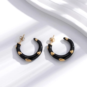 C-shaped chunky black heart hoop earrings with gold spikes in bohemian stainless steel