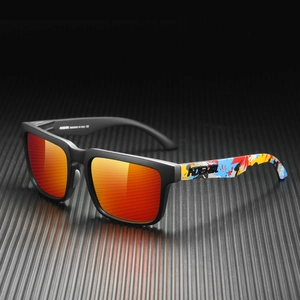 Detail of square polarized sunglasses with orange reflective lenses and graffiti temples