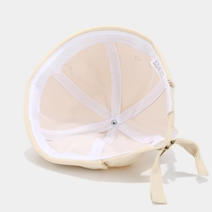 Off-white cotton docker hat interior view with reinforced band and adjustable strap