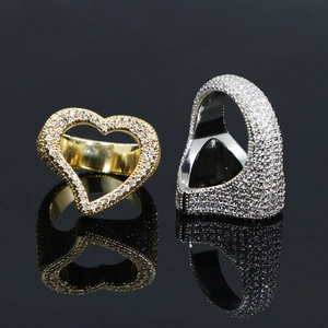 Hip hop style hollow heart rings in gold and silver finish with sparkling zircon stones