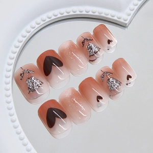 Sparkling gradient rose heart nails with shimmer floral accents in long square shape