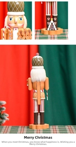 Detailed view of 38cm wooden nutcracker chef with gingerbread base and candy cane