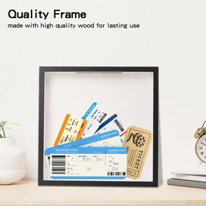 Detail of black wooden memory box frame for travel tickets and cinema stubs