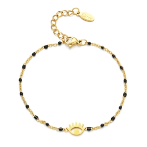Detail of gold stainless steel bracelet with black beads and evil eye charm and clasp