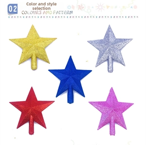 Detailed view of colorful glitter star tree toppers in gold, silver, blue, red, and pink