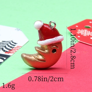 Detailed view of crescent moon pendant with Santa hat and dimensions 2.8cm by 2cm