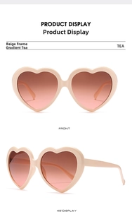 Detail view showing front and side angles of cream beige heart-shaped sunglasses