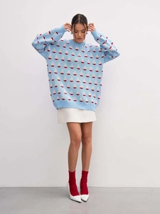 Pull en maille bleu ample avec motif jacquard de voiliers blancs et manches longues