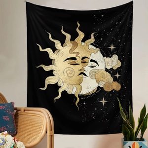 Detail of celestial tapestry featuring sun and moon embrace with gold star patterns