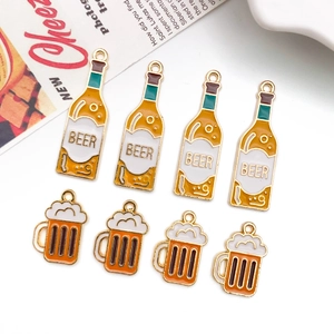 Flat lay of alloy beer bottle and mug charms for DIY handmade bracelets and necklaces
