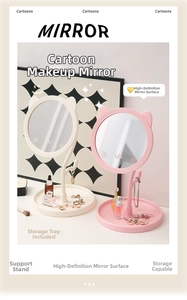 Detail of cartoon cat makeup mirror with cat ear decor and jewelry storage tray base