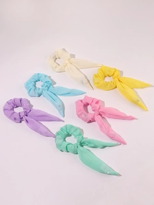 Close-up of 6-piece chiffon bow hair ties in assorted pastel macaron colors with ribbons