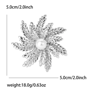 Detailed view of silver snowflake brooch with pearl, diameter 5.0cm and weight 18.0g