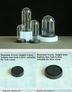 Macro detail of various base sizes and battery compartments for clear display domes