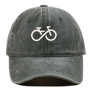 Close-up of white bicycle and infinity embroidery on washed charcoal cotton baseball cap
